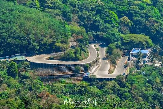 Scenic mountain road and green hills